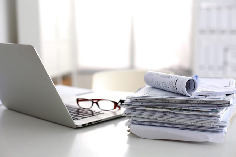 Laptop and newspaper